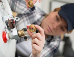 Home boiler with warning signs, highlighting common Leeds boiler problems and tips for spotting issues and finding reliable repair solutions