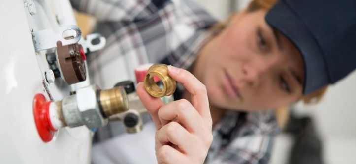 Home boiler with warning signs, highlighting common Leeds boiler problems and tips for spotting issues and finding reliable repair solutions