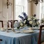 Elegant Charleston SC wedding reception with dusty blue and ivory coastal décor