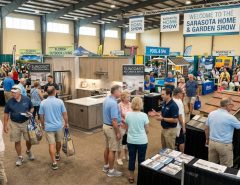 Visitors exploring remodeling booths at a Sarasota home show