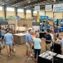 Visitors exploring remodeling booths at a Sarasota home show